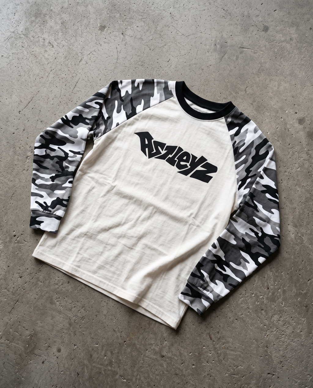 Astleyz Snow Camo Raglan – on concrete